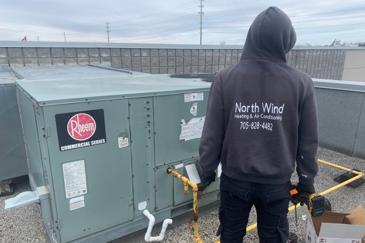 North Wind HVAC Blog Images commercial furnace compliance ch licensed HVAC professional installing a furnace